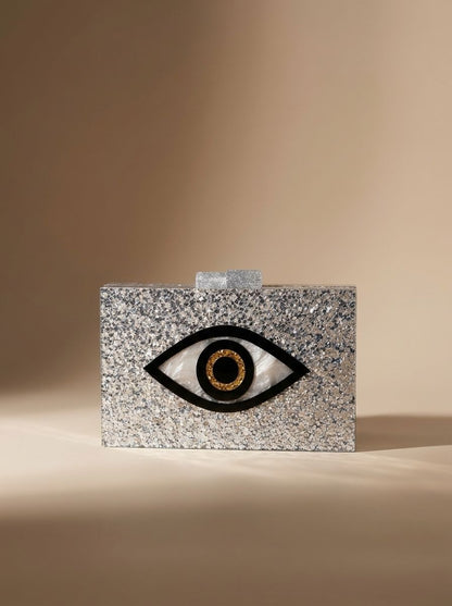 Pochette œil porte-bonheur argentée