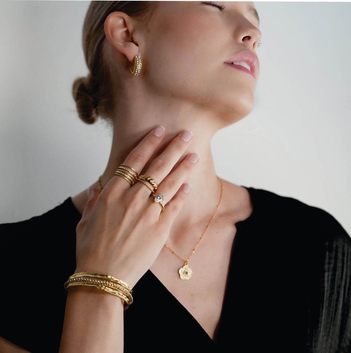 BELLINA Gold: Triple Stacked Textured Bracelet Zirconia (CZ) Embedded Tennis Bracelet at Centre. Stacked for Glamour.
