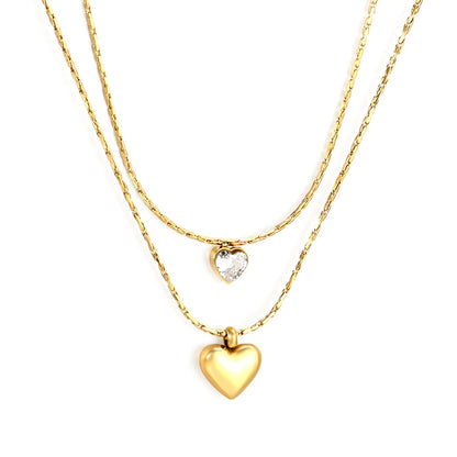 Collier en chaîne à cœurs superposés