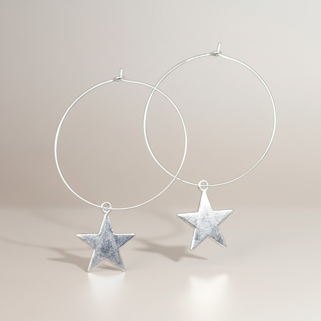 Boucles d'oreilles créoles en plaqué argent avec étoile