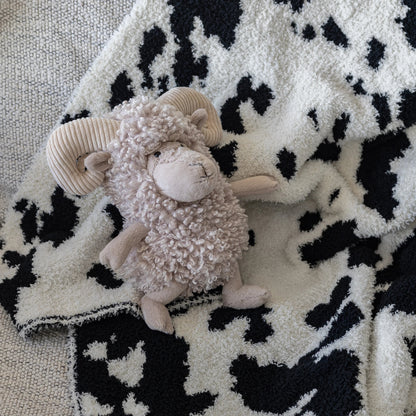 Couverture de bébé en imprimé vachette, modèle claquette et gypsophile
