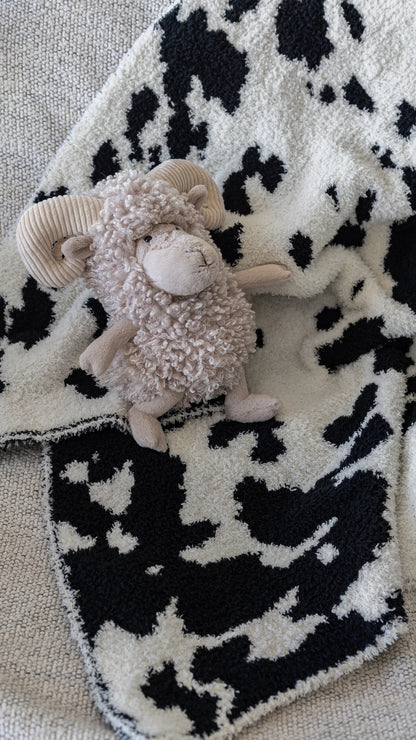 Couverture de bébé en imprimé vachette, modèle claquette et gypsophile