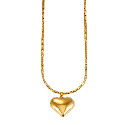 ABEL : Chaîne en câble ouvragée avec pendentif Cœur gonflé en or.