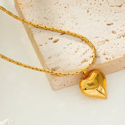 ABEL : Chaîne en câble ouvragée avec pendentif Cœur gonflé en or.