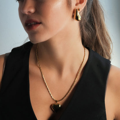 ABEL : Chaîne en câble ouvragée avec pendentif Cœur gonflé en or.