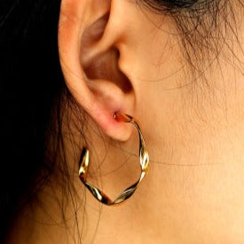 Boucles d'oreilles créoles sculpturales ADAMMA