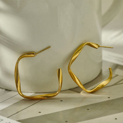 Boucles d'oreilles créoles sculpturales ADAMMA