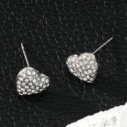 ADORE Or blanc (ton argenté) : Clous d'oreilles en forme de cœur sertis de zircons cubiques (CZ) - Déclaration d'amour