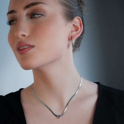 AGULHAS Or Blanc (Ton Argent) : Élégance Céleste - Collier Chaîne Peau de Serpent avec Pendentif Étoile Incrusté de Zirconium