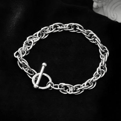 ARDA Or blanc ton argent : Bracelet multimaillons épais et complexe avec fermoir circulaire et en T