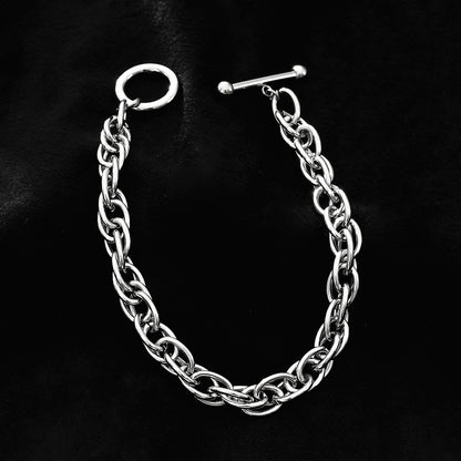 ARDA Or blanc ton argent : Bracelet multimaillons épais et complexe avec fermoir circulaire et en T