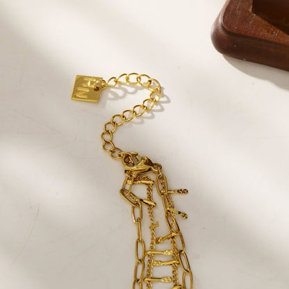 BRONTE : Collier superposé à 2 chaînes avec chaîne minimaliste à maillons trombone et chaîne à maillons ornée d'un crochet