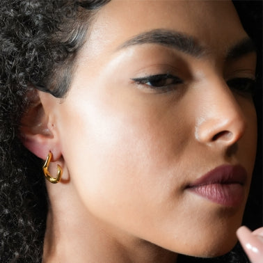 Boucles d'oreilles créoles forme abstraite CAGLIO dorées