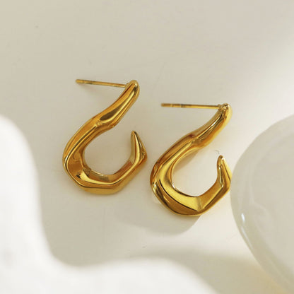 Boucles d'oreilles créoles forme abstraite CAGLIO dorées