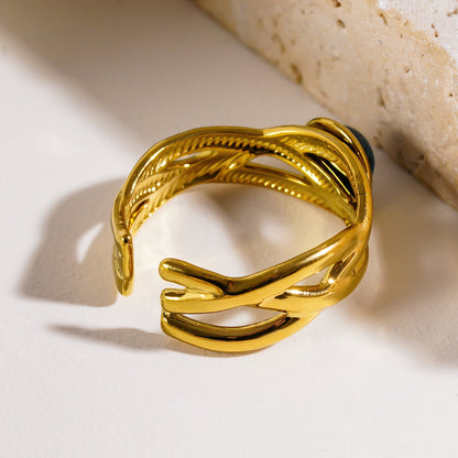 CHESA : Bague empilable torsadée avec pierre naturelle centrale.
