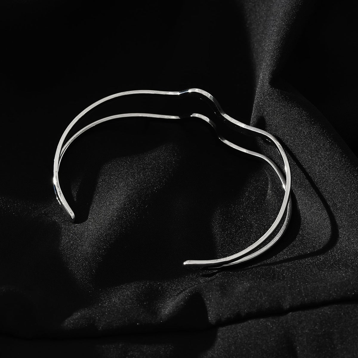 CHITRA: Industrial-Chic Bracelet with Abstract Shaped Parallel Bands in Silver Toned White Gold