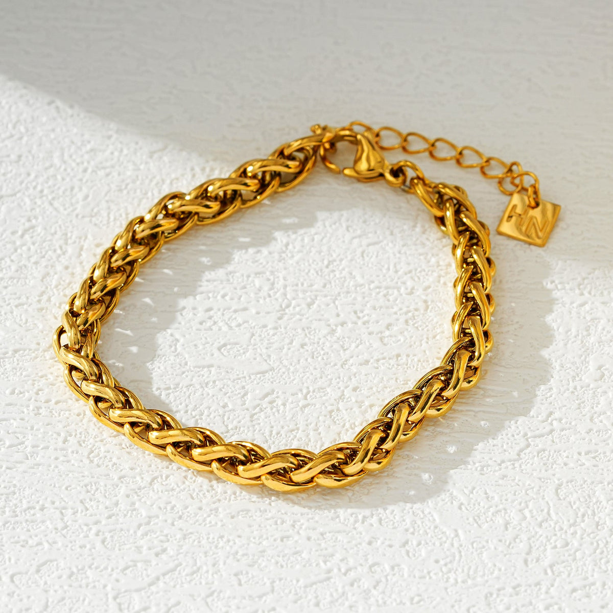 Style CLOVELLY : Bracelet épais à mailles ovales entrelacées