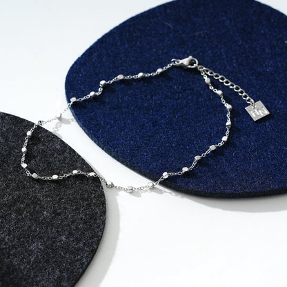 DEMELZA LG : Cheville contemporaine en argent avec de délicates perles carrées