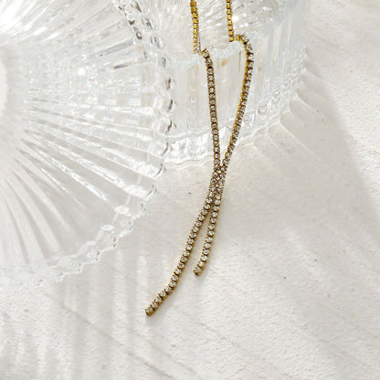 DIANA Collier chaîne avec zircons sertis pavé et détail lariat