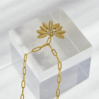 Chaîne trombone ENOLA Mini avec feuilles et pendentif zircon en or