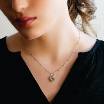 ETERNAL : Collier pendentif double cœur serti de zircones pavées