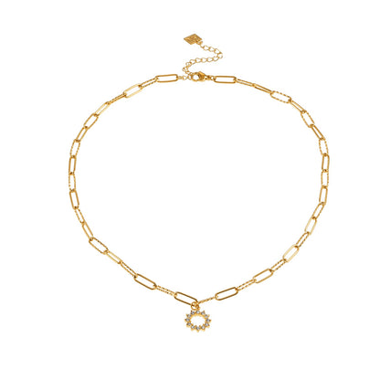 FRETTA: Radiant Star Shaped Pendant Zirconia Paper-Clip Chain Necklace in Gold.