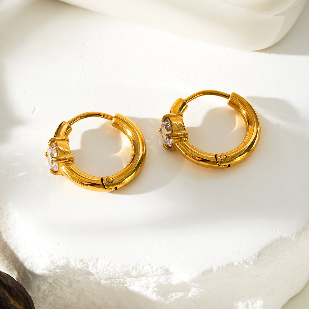 GALENA Gold: Mini Hoop Gold Earrings with a Rounded Moissanite Stone