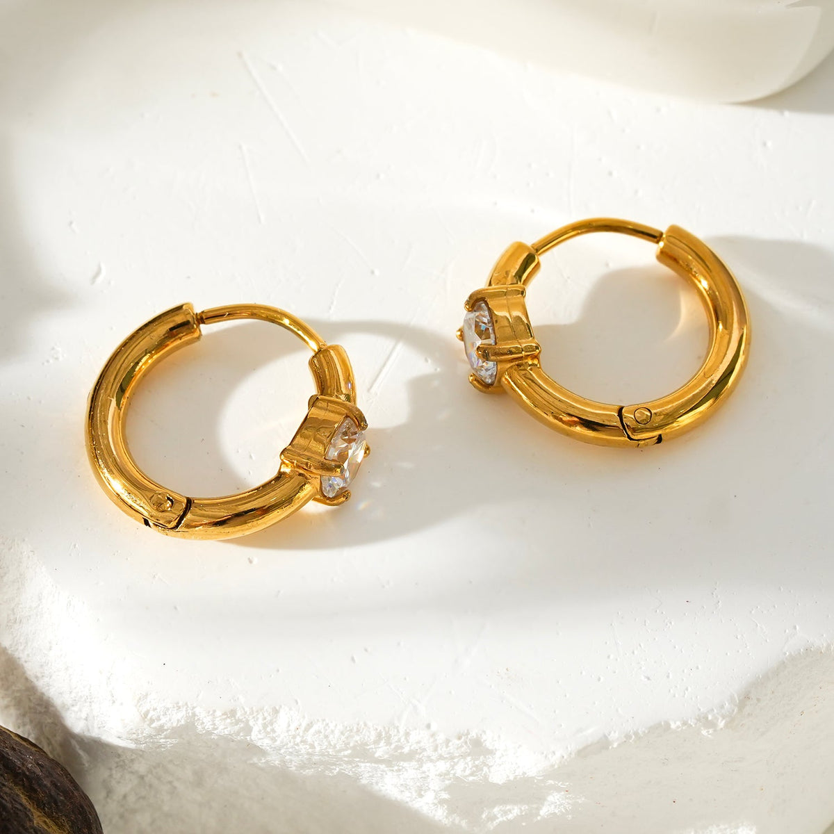 GALENA Gold: Mini Hoop Gold Earrings with a Rounded Moissanite Stone