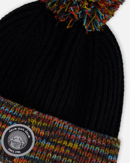 Bonnet d'hiver en maille doublé avec pompon noir et multicolore