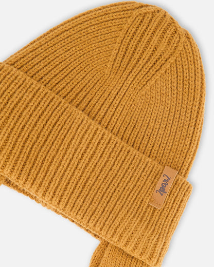Bonnet en tricot mi-saison bébé marron noix de pécan