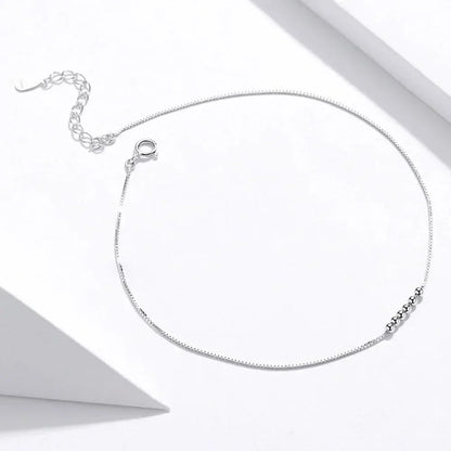 La délicate chaîne de cheville en argent sterling 925 avec perles