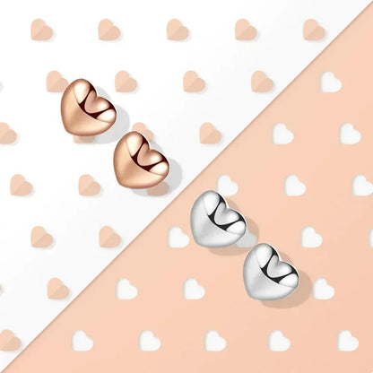 Boucles d'oreilles clous petites cœurs unies en argent sterling 925 | Bijoux fins minimalistes
