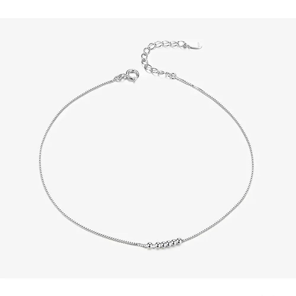 La délicate chaîne de cheville en argent sterling 925 avec perles
