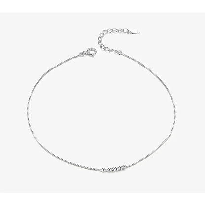 La délicate chaîne de cheville en argent sterling 925 avec perles
