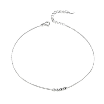 La délicate chaîne de cheville en argent sterling 925 avec perles