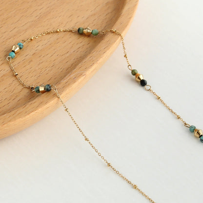 IMANI : Collier à fines chaînes dorées avec perles et pierres naturelles