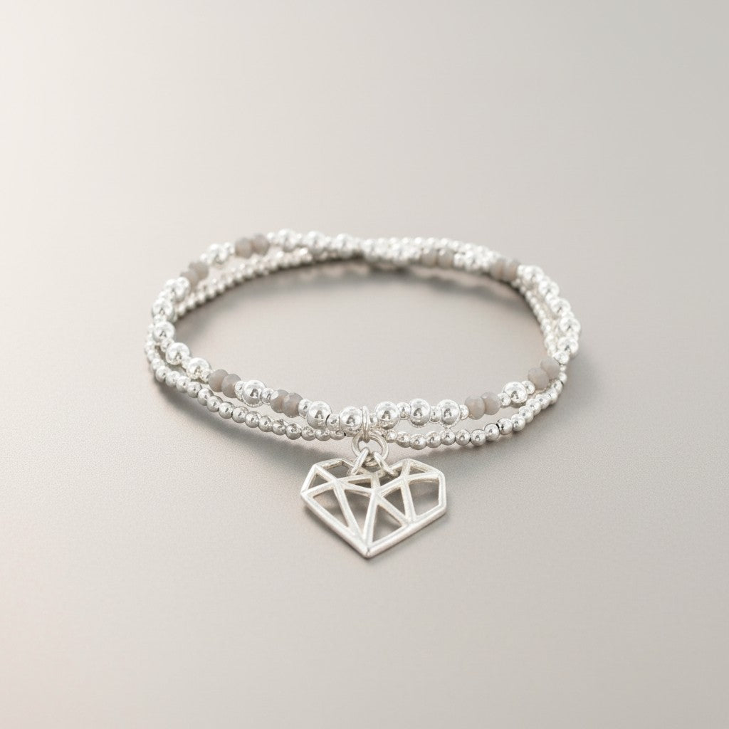 Bracelet double rang avec pendentif cœur en plaqué argent