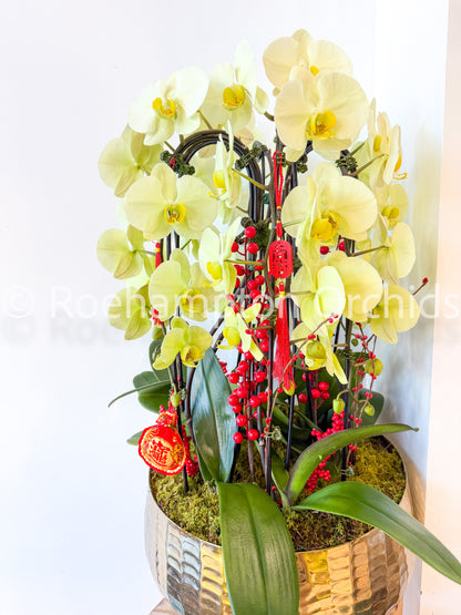 Arrangement porte-bonheur doré