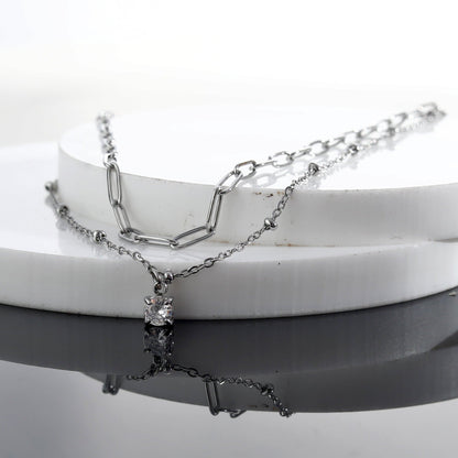 KATERI Argent : Collier chaînes superposées avec pendentif breloque solitaire zircone