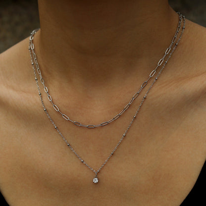 KATERI Argent : Collier chaînes superposées avec pendentif breloque solitaire zircone