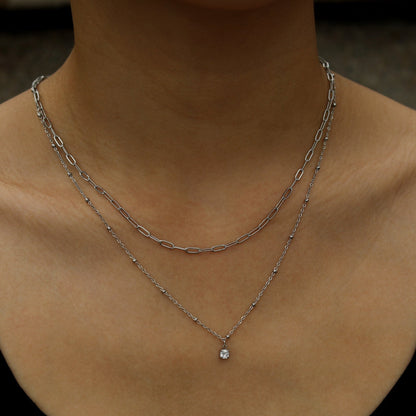KATERI Argent : Collier chaînes superposées avec pendentif breloque solitaire zircone