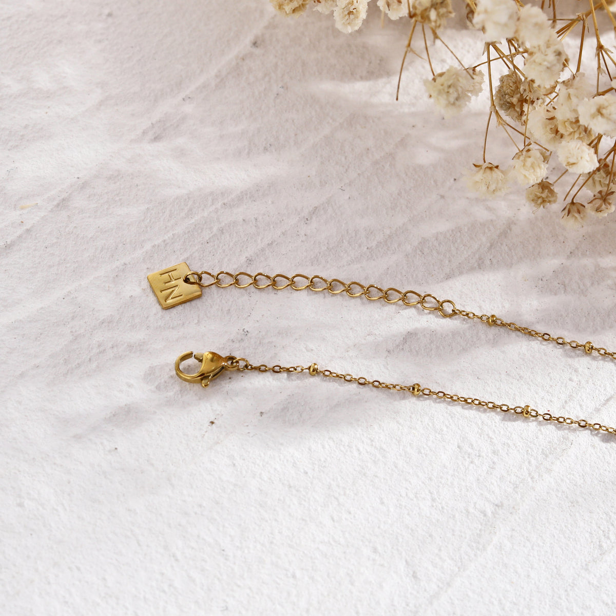 MALVINA Collier chaîne dorée avec pendentif étoile serti de zirconiums
