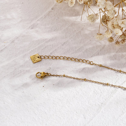 MALVINA Collier chaîne dorée avec pendentif étoile serti de zirconiums