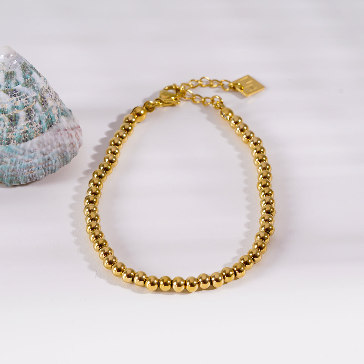 MANAMI Or : Bracelet en chaîne contemporain perles-boules
