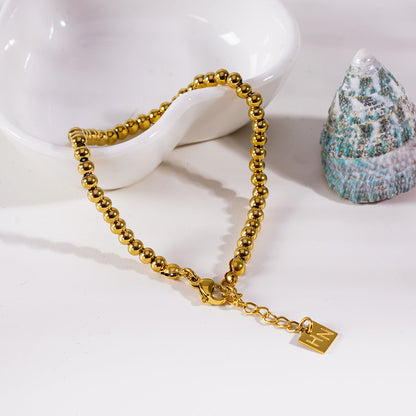 MANAMI Or : Bracelet en chaîne contemporain perles-boules