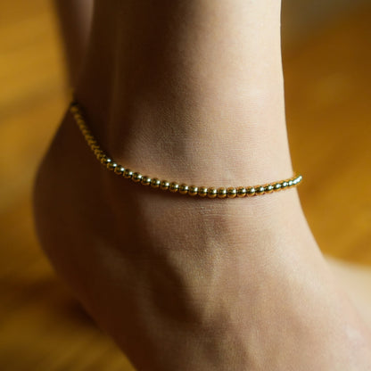 MANAMI LG : Chaîne de cheville contemporaine en or avec perles-boules