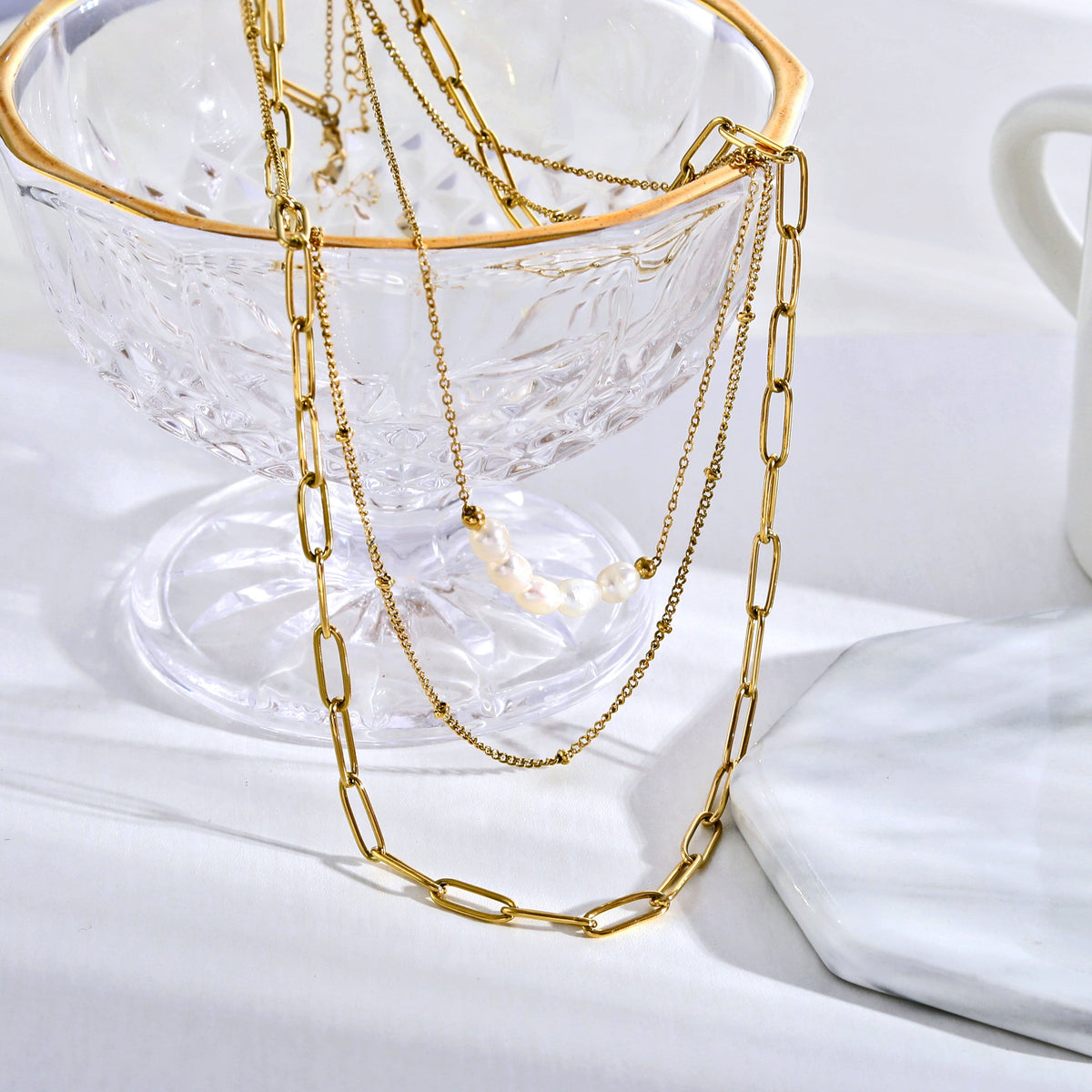 Collier MARLI multichaînes 3 rangs en or avec perles naturelles