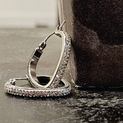 Boucles d'oreilles créoles en argent style MELFI : en forme de cœur abstrait incrusté de zircons