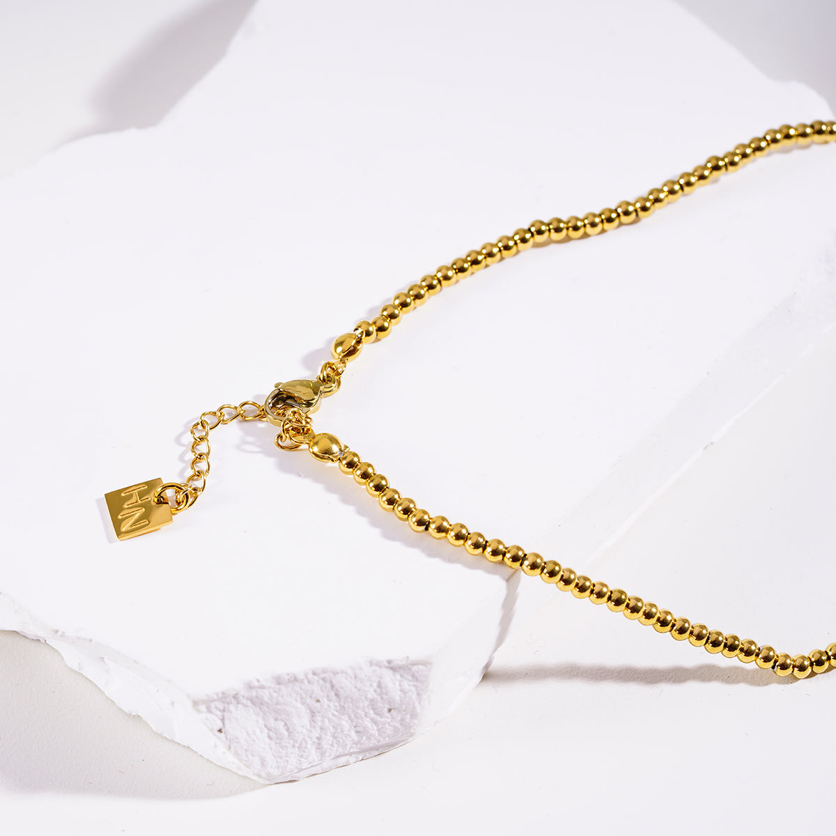 Style MILLIE : Collier chaîne en or à double perles fusionnées
