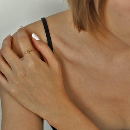 NICOLE Gold: Textured Ring with a Four Point Star Centre Piece